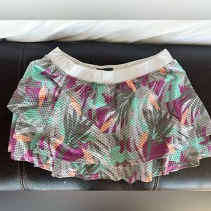 Lija tennis skirt tiered layers colorful with built in shorts. Size M